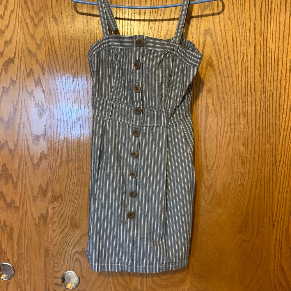 Navy Blue Sundress with vertical white stripes.